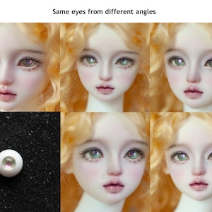 May include: A collage of doll faces with varying eye colors and angles, showcasing the phrase "Same eyes from different angles." The dolls have blonde hair, rosy cheeks, and detailed facial features. A single doll eye is also shown.