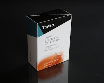 May include: A box of Teavert Organic Black Tea Collection with a black and teal design. The box contains six natural black tea flavors: English Breakfast, Earl Grey, and Darjeeling 2nd Flush.