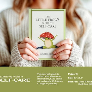 A person holding a hardcover copy of 'The Little Frog's Guide to Self-Care' book featuring a whimsical illustration of a frog wearing a mushroom cap. Text details the book's size, pages, and uplifting illustrations.