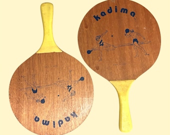 Set of 2 vintage Kadima wooden paddles | wood Kadima racquets with graphic art | dorm decor | yellow handles | wood beach paddleball set
