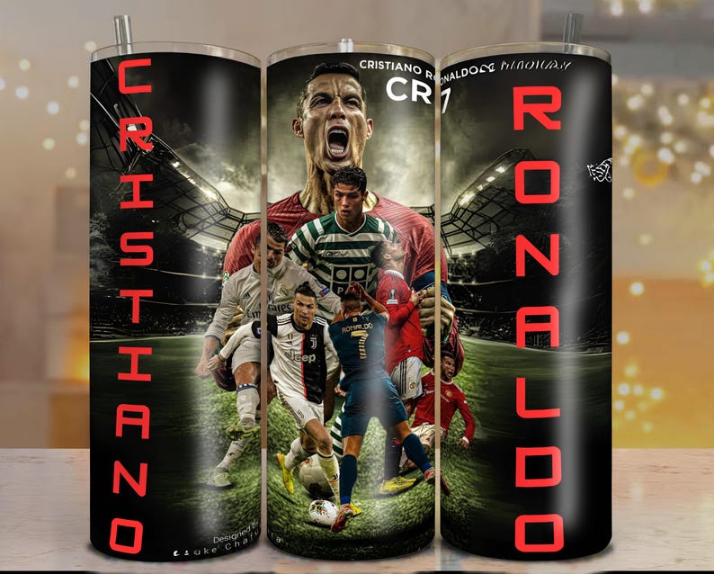 May include: A black tumbler featuring a collage of Cristiano Ronaldo in various soccer poses. The name "Cristiano" is printed vertically in red, and "Ronaldo" is printed vertically in red on the opposite side. The background shows a stadium.