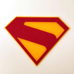 Super Hero Logo Wall Art – Modern Shield Design | Comic-Inspired Home Decor