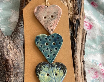 Beautiful ceramic raku fired heart buttons