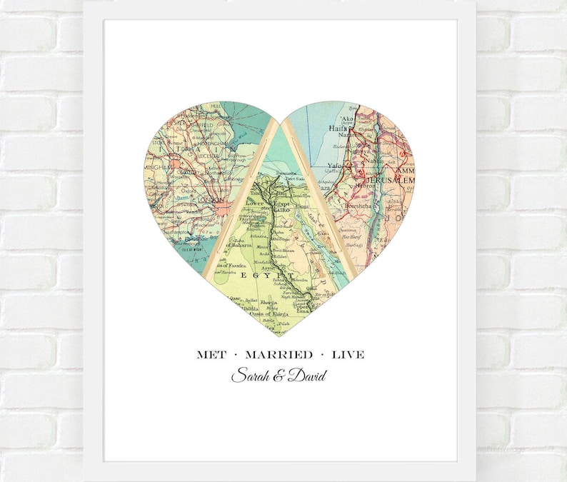 A customized map art print with several city map locations and personalized text with 'Met Married Live', the couples names and the parents wedding anniversary date under the heart map.