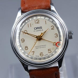 Reloj de hombre ORIS Pointer Date 302-7285B plateado/dorado, manual, 31,5 mm