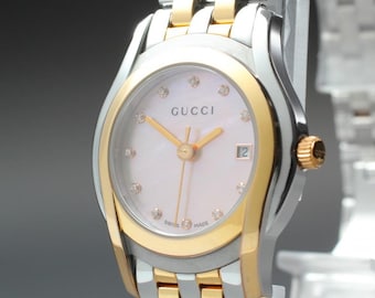 Nahezu neuwertige GUCCI 5500L Damenuhr, rosa Perlmutt, Quarz, 26,6 mm
