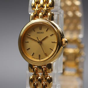 Seiko Tisse 1F21‑5A00 ゴールド SEIKO 1F21-5A00 16mm Women's Watch Inside & Battery