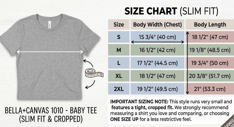 Peut inclure: Un t-shirt b&eacute;b&eacute; gris Bella+Canvas 1010, coupe ajust&eacute;e et courte, avec un tableau des tailles indiquant la largeur et la longueur du corps en cm. Tailles de S &agrave; 2XL, largeurs de corps de 40 cm &agrave; 49,5 cm. Longueur du corps jusqu'&agrave; 53,3 cm.