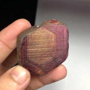 May include: A set of three ceramic mugs with a speckled, matte finish in cream, light grey, and dark grey. Each mug has a simple, minimalist design, ideal for coffee or tea.