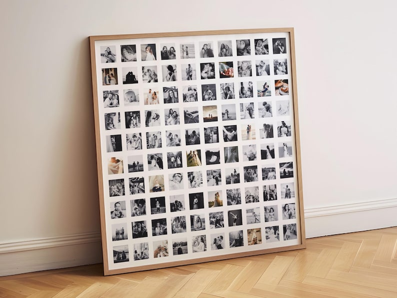 May include: A large square wall frame with a light wood finish containing a grid of eighty-one individual black and white square photographs arranged in nine rows and nine columns, displayed against a white mat board border within the frame.