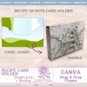Könnte beinhalten: Ein Rezept- oder Notizkartenhalter mit floralem Design in Blau- und Cremetönen. Der Halter wird offen und geschlossen gezeigt, mit dem Wort "RECIPES" sichtbar. Das Bild enthält auch den Text "CANVA Drag & Drop Frames".
