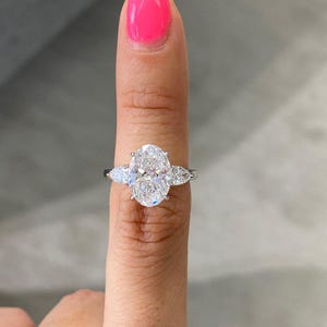 Oval Moissanite Engagement Ring: 14K White Gold Floral Filigree, Three Stone