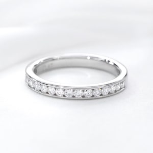Round Moissanite Eternity Band: 14K White Gold Channel Set