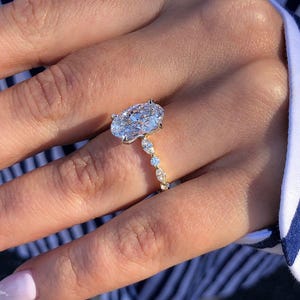 Oval Moissanite Engagement Ring: 14K Yellow Gold Hidden Halo