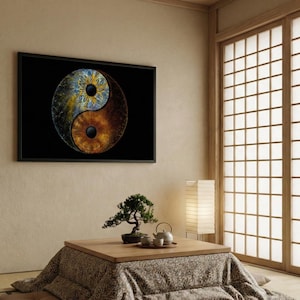 May include: A rectangular wall art print featuring a yin and yang symbol composed of two human irises. The top half is a blue and yellow iris, while the bottom half is a brown iris. The artwork is set against a solid black background and framed.