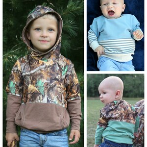 May include: Two children wearing camouflage hooded sweatshirts with brown and green accents. The sweatshirts have a pocket on the front. The children are wearing blue jeans.