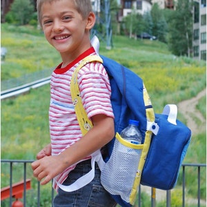 May include: A young person wearing a red and white striped shirt with a blue and yellow backpack. The backpack has a mesh side pocket with a clear water bottle inside.