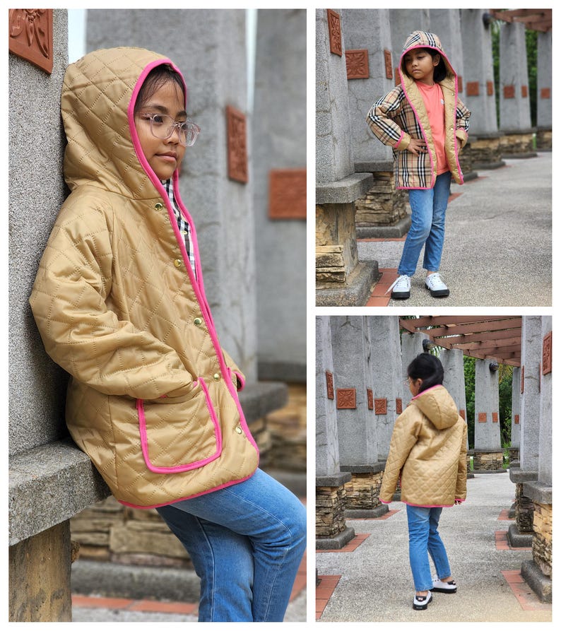 May include: A quilted jacket with a hood, featuring a gold colour with pink trim. The jacket has a zip closure and pockets. The model is wearing blue jeans.