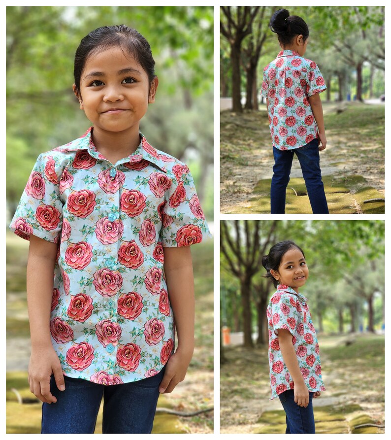 Puede incluir: Una persona joven lleva una camisa de manga corta de color azul claro con botones y un estampado floral rosa y rojo. La camisa tiene cuello y cierre de botones. La persona lleva pantalones vaqueros azules.