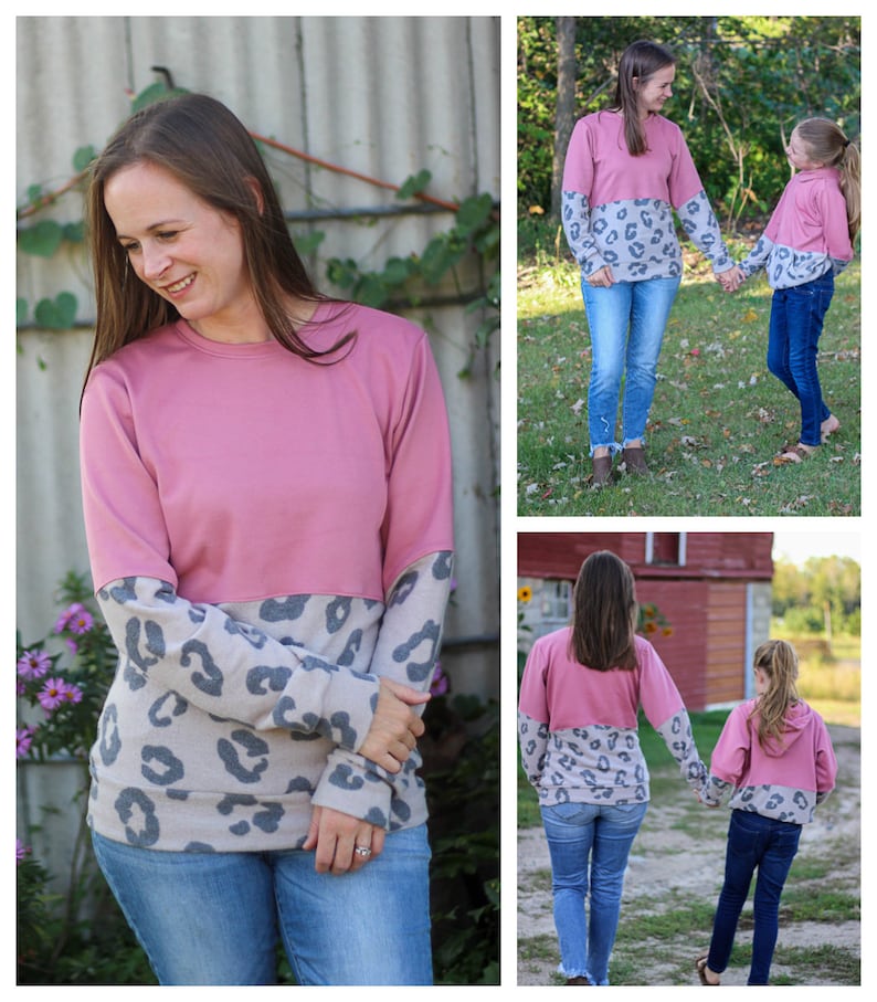 May include: Two people wearing pink and grey long-sleeved shirts with a leopard print pattern on the sleeves. The shirts are a split design with a solid pink top and a leopard print bottom. The people are wearing blue jeans.