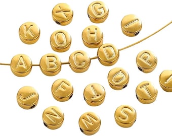 May include: Gold-colored alphabet beads, each with a single letter from the alphabet engraved on the surface. The beads are round and strung on a thin, gold-colored wire, perfect for jewelry making or crafting projects.