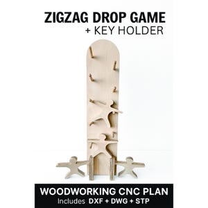 May include: A wooden zigzag drop game and key holder. The game features a tall, light-colored wooden board with pegs and cut-out human figures. The text "ZIGZAG DROP GAME + KEY HOLDER" is at the top. The bottom text reads "WOODWORKING CNC PLAN Includes DXF + DWG + STP".