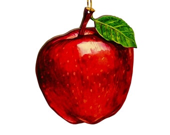 May include: A red apple ornament with a green leaf and a gold wire hanger.