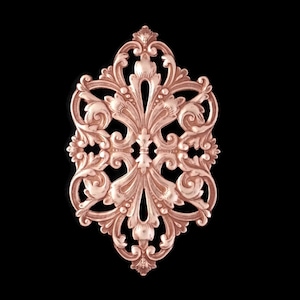 May include: A rose gold decorative metal ornament with a detailed floral design.