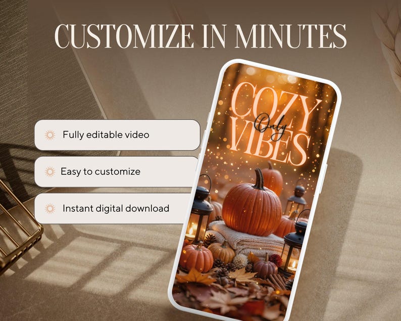May include: A smartphone displays a fall-themed image with pumpkins, lanterns, and the text "Cozy Vibes Only." The phone is set against a neutral background with text that reads "Customize in Minutes" and options for video, customization, and download.