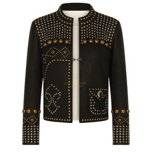 May include: Black leather jacket with silver and gold-toned stud and rivet embellishments. The jacket features a mandarin collar, long sleeves, and a hook-and-eye closure. The text "LUXE LEATHER APPAREL" is visible on the jacket.