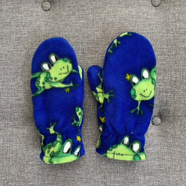 Frog mittens!!  Double layer fleece mittens in fun pattern of green frogs on royal blue background