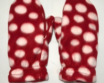 Double layer fleece mittens in red with white polka dots