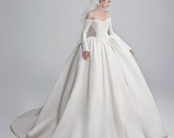 Luxe satijnen westerse bruidsjurk baljurk – off-shoulder aangepaste bruidsjurk met lange mouwen