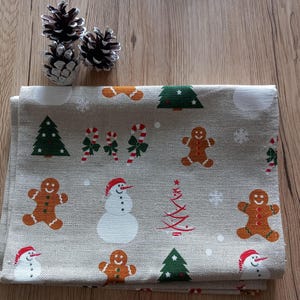 Christmas Kitchen Tea towel . Home decor. Gingerbread and snowman linen towel. Christmas gift .Christmas party decor.