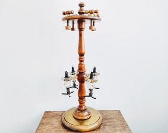 Vintage fransk alkoholhaltig dryck whiskey gin vodka cognac spritdispenser kranskåp skivspelare träbar cirka 1960-70-talet / EVE of Europe