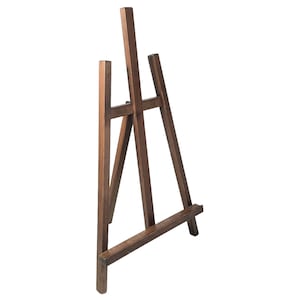 May include: A wooden easel with a dark brown finish. The easel is made of sturdy wood and has a simple design.