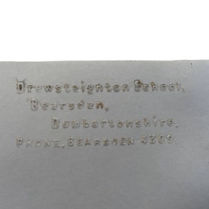 May include: A white card with the text "Brewsteignton School, Bearsden, Dumbartonshire. PHONE, BEARSDEN 4369" printed on it.