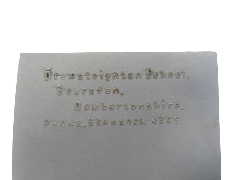 May include: A white card with the text "Brewsteignton School, Bearsden, Dumbartonshire. PHONE, BEARSDEN 4369" printed on it.