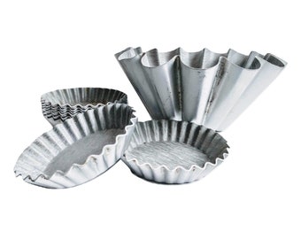 Vintage Franse set van negen lichtgewicht cake pudding bakvorm bakvorm patisserie lampenkap lampenkap licht jaren 80 / vooravond van Europa