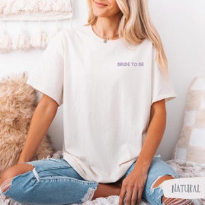 May include: A handmade wooden sign with the word "Welcome" in a playful font. The sign has a distressed finish and a simple, rustic design, suitable for a front door or entryway. The sign is approximately 30 cm wide.