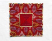Fall table square, patchwork centerpiece, red and gold ikat candle quilt, fabric table runner