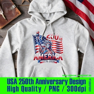Puede incluir: Una sudadera con capucha blanca con un diseño gráfico que celebra el 250 aniversario de los Estados Unidos. El diseño incluye la Estatua de la Libertad, la bandera estadounidense y el texto "AMERICA 1776-2026". Es una descarga digital.