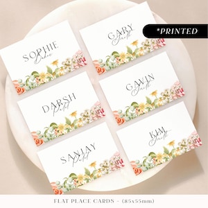 Tarjetas de lugar para bodas con flores de color rosa ruborizado, tarjetas de nombre para invitados con estampado floral vintage romántico, tarjetas de lugar planas o dobladas con flores silvestres en tonos pastel suaves.