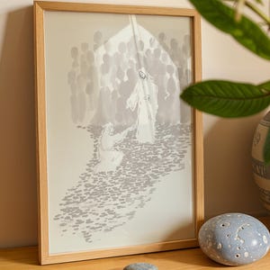 Può includere: Una stampa incorniciata con un'illustrazione in scala di grigi di una scena religiosa. L'opera raffigura una figura in una veste bianca, circondata da una folla, con un'altra figura in ginocchio. La cornice è in legno chiaro.