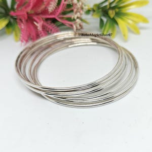 Handmade Sterling Silver Bangle Set - 7 Stacking Bangles