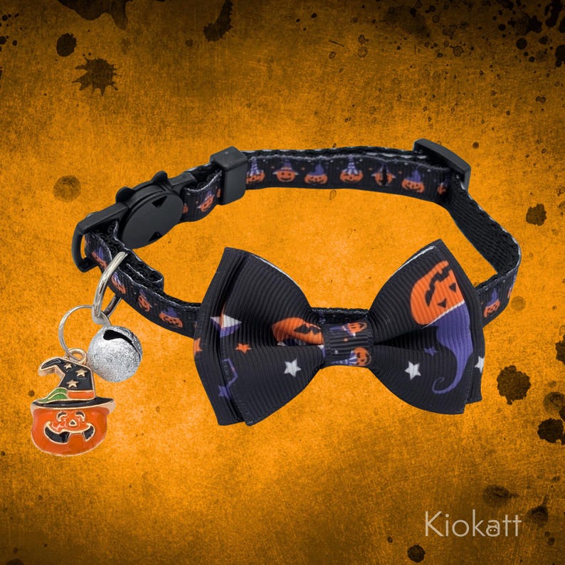 May include: Black Halloween-themed cat collar with a matching bow tie. The collar features a pattern of pumpkins and witch hats. A silver bell and a pumpkin charm with a witch hat are attached. The bow tie has a pumpkin and star design.