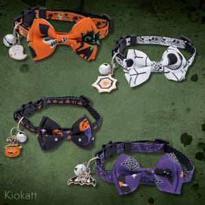 May include: Four Halloween-themed cat collars with bowties and charms. The collars feature orange, black, white, and purple patterns with Halloween icons like cats, pumpkins, bats, and spiderwebs. Each collar has a bell and a charm.