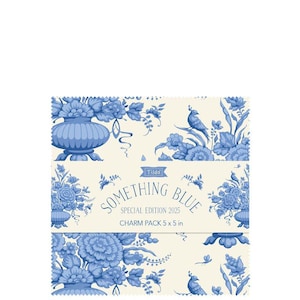 May include: A fabric charm pack with a blue floral design and the text "Something Blue Special Edition 2025". The pack measures 5 x 5 inches and features illustrations of flowers, birds, and vases.