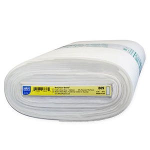 May include: A roll of white Pellon 809 Decor Bond fabric. The label reads "809 Decor Bond" and includes care instructions. The fabric is made of 60% polyester and 40% rayon. Made in the USA.