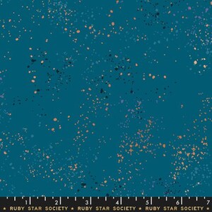May include: Teal fabric with a speckled pattern. The fabric features small, irregular dots in shades of orange, black, and purple scattered across the surface. The text "RUBY STAR SOCIETY" is printed at the bottom.